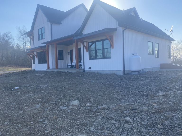 A photo of an unlandscaped yard used as a base for a 3D model