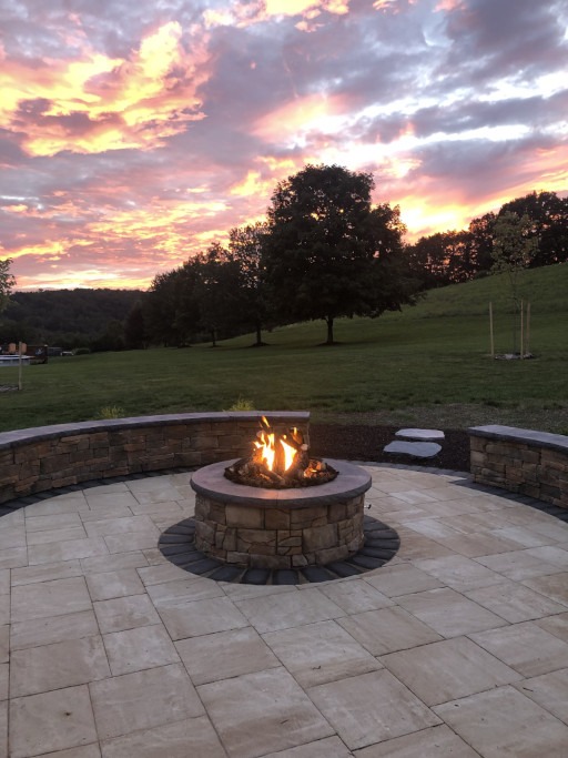 A hardscaped fire pit