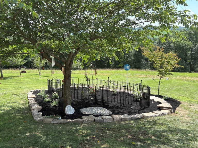 A landscaped memorial for a pet